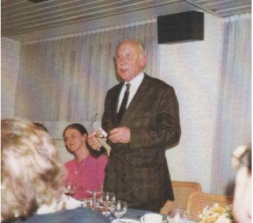 Photo of Marcel Seynave talking at a meeting